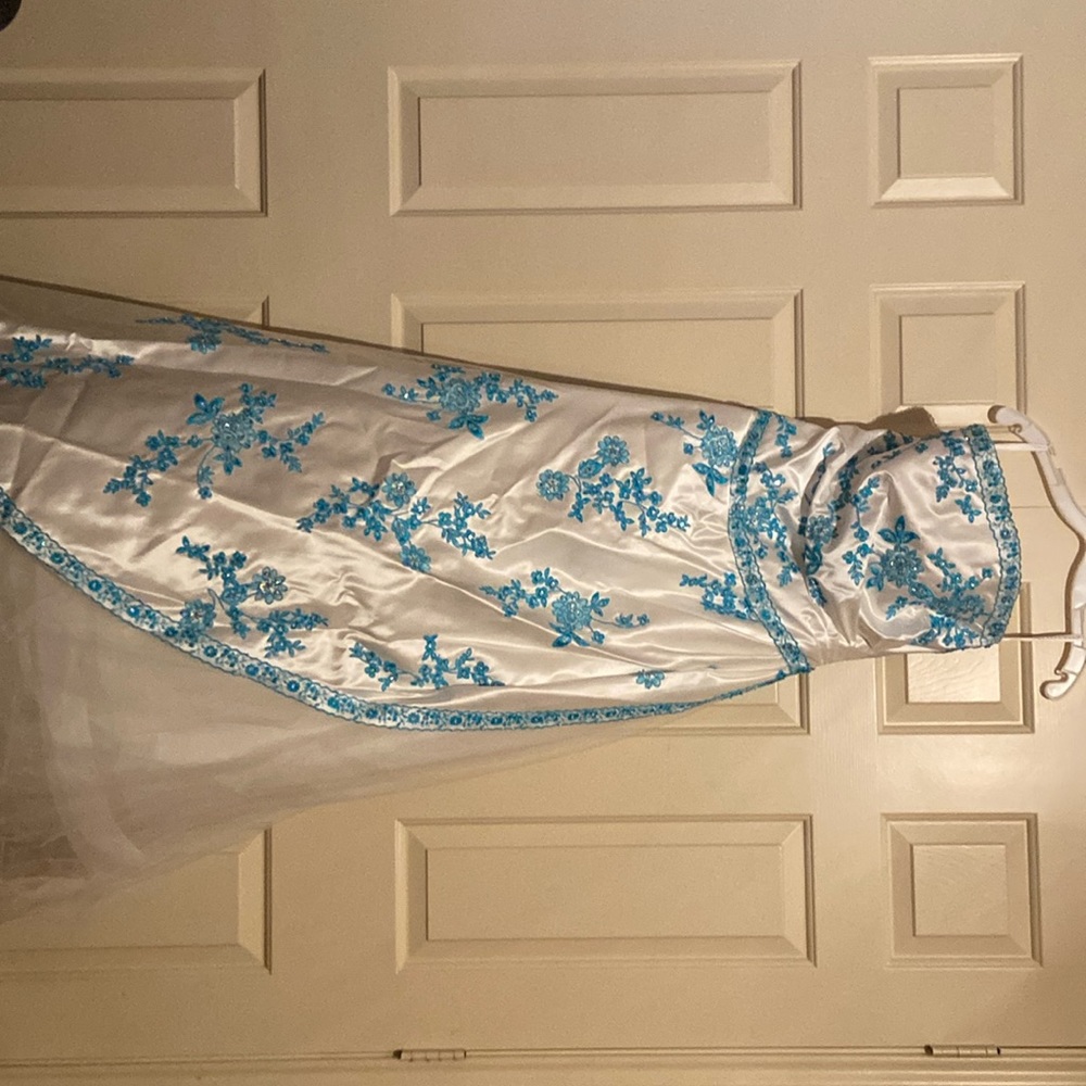 Beautiful strapless full length prom dress with embroidery and sequin details